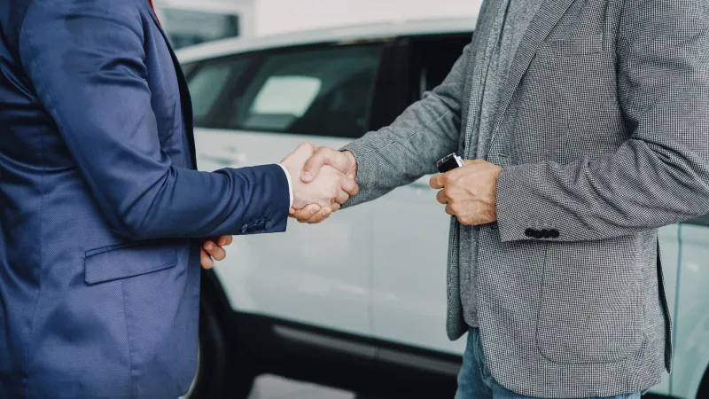 When a Firm Grip Closed the Deal: The Long Decline of the American Handshake Agreement